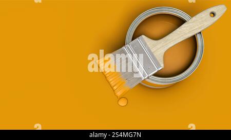 Orange paint can with brush on orange background Stock Photo