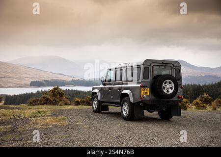 Land Rover Defender 110 in the Highlands of Scotland. Stock Photo