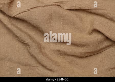 A brown wrinkled fabric in a close up view Stock Photo