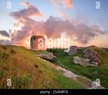 Majestic summer sunset view of ancient Crimean fortress (near Sevastopol Town, Crimea, Ukraine). Composite photo with considerable depth of sharpness. Stock Photo