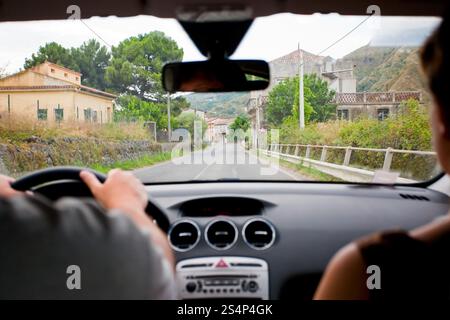 driving a car on rural road in Italy Stock Photo