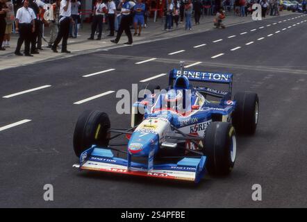 French motorsports racing driver Jean Alesi on Benetton Renault B197 F1 car, 1997 Stock Photo