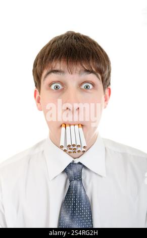 Shocked Young Man with Many Cigarettes in his Mouth. Isolated on the white background Stock Photo