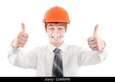 Happy Young Man in Hard Hat showing thumb up Isolated on the white Background Stock Photo