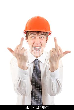 Extremely Angry Young Man in Hard Hat showing Middle Finger gesture Stock Photo