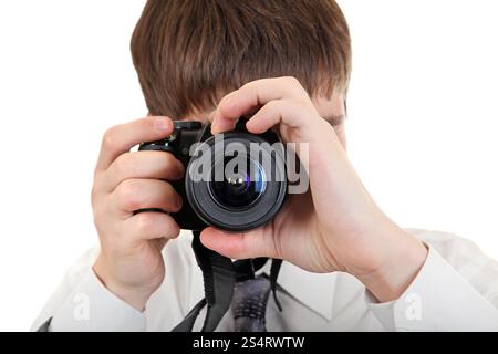 Young Man Take a Picture with a Camera Isolated on the White Background Stock Photo