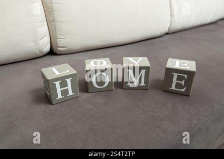Conceptual photo of word home and love written on toy bricks Stock Photo