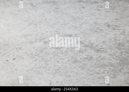 grey painted background surface, selective focus Stock Photo