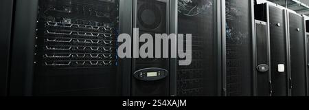 High-tech server room filled with servers, emphasising modern design and digital security measures, banner Stock Photo