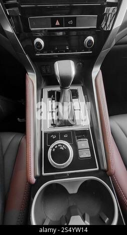 Automatic gearbox handle in a car as background Stock Photo