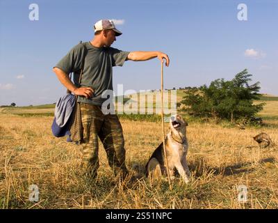 europe, greece, thrace, elafochori village, sherpherd and his dog Stock Photo