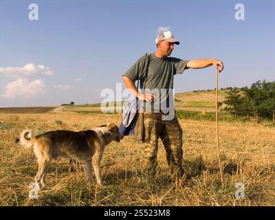 europe, greece, thrace, elafochori village, sherpherd and his dog Stock Photo