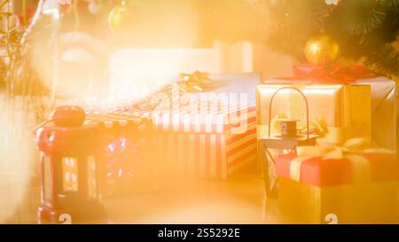 Abstract photo with golden lights shining over Christmas gifts and presents. Abstract image with golden lights shining over Christmas gifts and Stock Photo