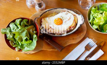Swiss cheese crust with fried egg Stock Photo