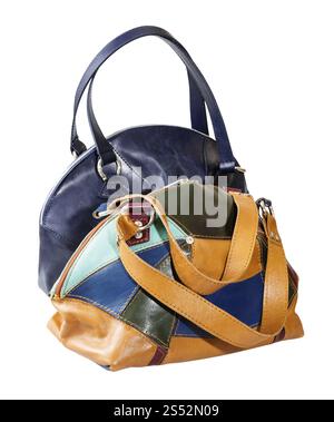 side view of two handmade leather handbags isolated on white background Stock Photo