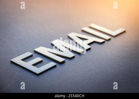 Word email written with white solid letters on a board. Word email written with white solid letters Stock Photo