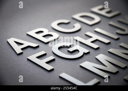 Alphabet detail made with solid letters on a blackboard. Alphabet made with solid letters Stock Photo