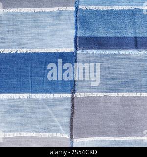 textile square background - patchwork from various denim flaps. patchwork from various denim flaps Stock Photo