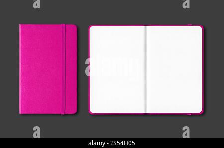 Pink closed and open notebooks mockup isolated on black. Pink closed and open notebooks isolated on black Stock Photo