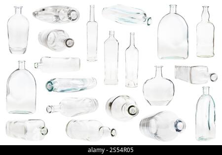 set of various empty clear bottles isolated on white background. set of various empty clear bottles isolated Stock Photo