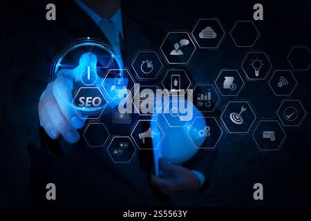 Seo Optimization for website with mobile website and Landing page virtual diagram.engineer pushing start button on touch screen computer interface Stock Photo
