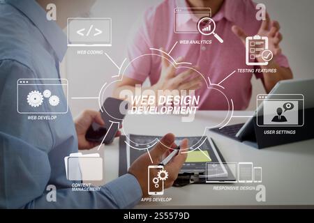 Developing programming and coding technologies with Website design in virtual diagram.Businessmen working together on a document and using smart Stock Photo