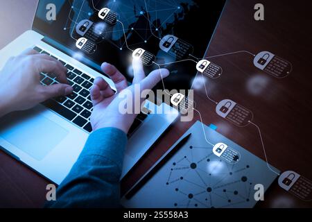 Blockchain technology concept with diagram of chain and encrypted blocks. Double exposure of businessman hand working with new modern computer and Stock Photo