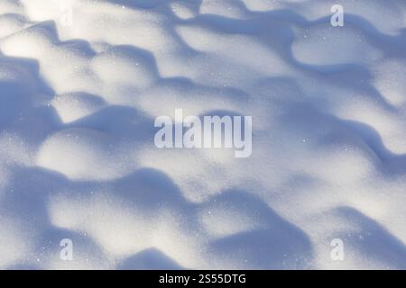 Hilly surface due to snow on uneven ground Stock Photo