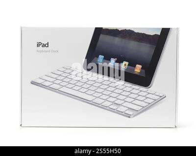 Apple iPad keyboard dock accessory product packaging boxed and wrapped in plastic. Isolated on white background with clipping path. Stock Photo