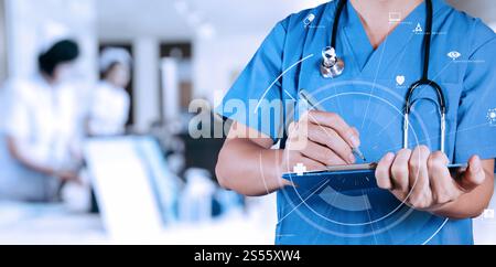 Smart medical doctor writing nformation patient medical on a clipboard at the hospital with VR icon diagram Stock Photo