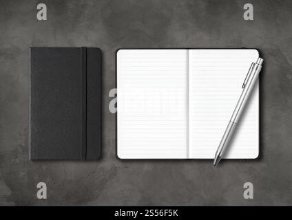 Black closed and open lined notebooks with a pen. Mockup isolated on dark concrete background. Black closed and open lined notebooks with a pen on Stock Photo