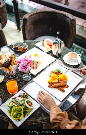 Full American Breakfast Huge healthy breakfast spread on a table with coffee Breakfast served with coffee English breakfast fried egg croissants Stock Photo