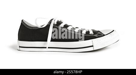 Black generic sneaker isolated on white background. Black sneaker isolated on white background Stock Photo