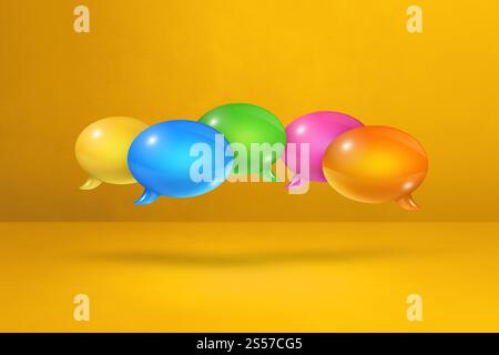 3D multicolor speech bubbles isolated on yellow background. multicolor speech bubbles on yellow background Stock Photo