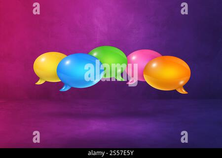 3D multicolor speech bubbles isolated on purple background. multicolor speech bubbles on purple background Stock Photo