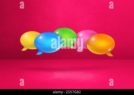 3D multicolor speech bubbles isolated on pink background. multicolor speech bubbles on pink background Stock Photo
