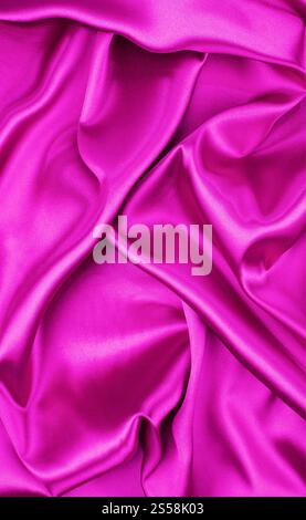 Closeup of rippled purple silk fabric background. Closeup of rippled purple silk fabric Stock Photo