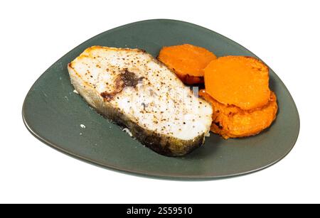 cod steak with boiled sweet potato isolated Stock Photo - Alamy