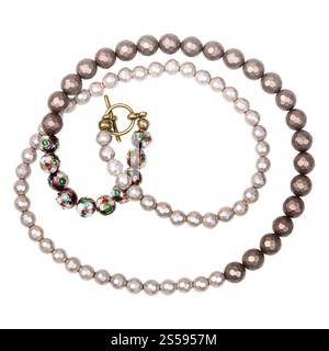 tangled handcrafted necklace from faceted mother-of-pearl beads and hand-painted cloisonne beads with enamel isolated on white backhround Stock Photo
