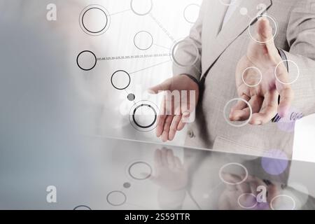 businessman hand showing blank flow chart on new modern computer as concept with bokeh exposure Stock Photo