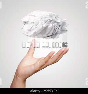 Businessman hand show crumpled paper Cloud Computing diagram as concept Stock Photo