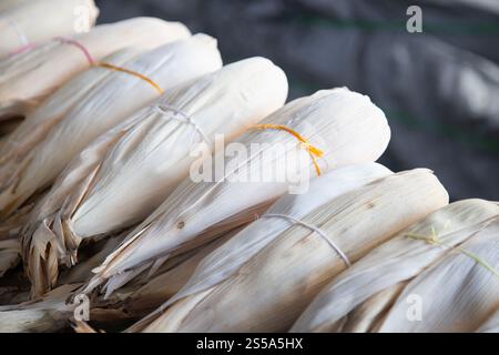 Stall selling corn husks for making tamales in Mexico, Mercado Abastos Oaxaca market. Stock Photo