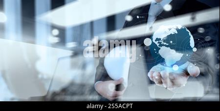 Double exposure of business engineer holding the earth and social network structure as concept Stock Photo
