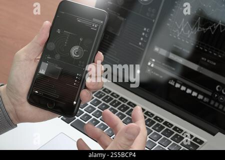 close up of hand using smart phone,laptop, online banking payment communication network technology 4.0,internet wireless application development sync Stock Photo