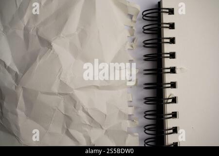 open spiral notebook And crumled page texture Stock Photo