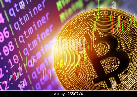 Decentralized cryptocurrency concepts, bitcoin on mining screen and trading chart. Transfer or exchange digital money through blockchain Stock Photo