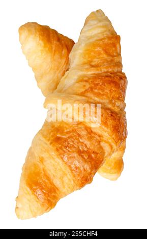 Top view of two brown or golden croissants in cross shape in stack is isolated on white background with clipping path. Stock Photo
