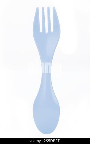 Blue plastic spork combining a spoon and fork in one utensil,isolated on a white background. for camping or outdoor use Stock Photo