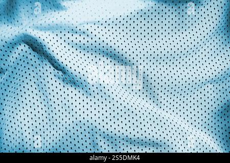 Close up of light blue polyester nylon sportswear shorts to created a textured background Stock Photo