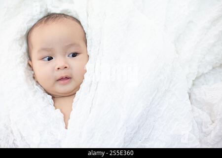 Cute little boy looking into the right side Stock Photo